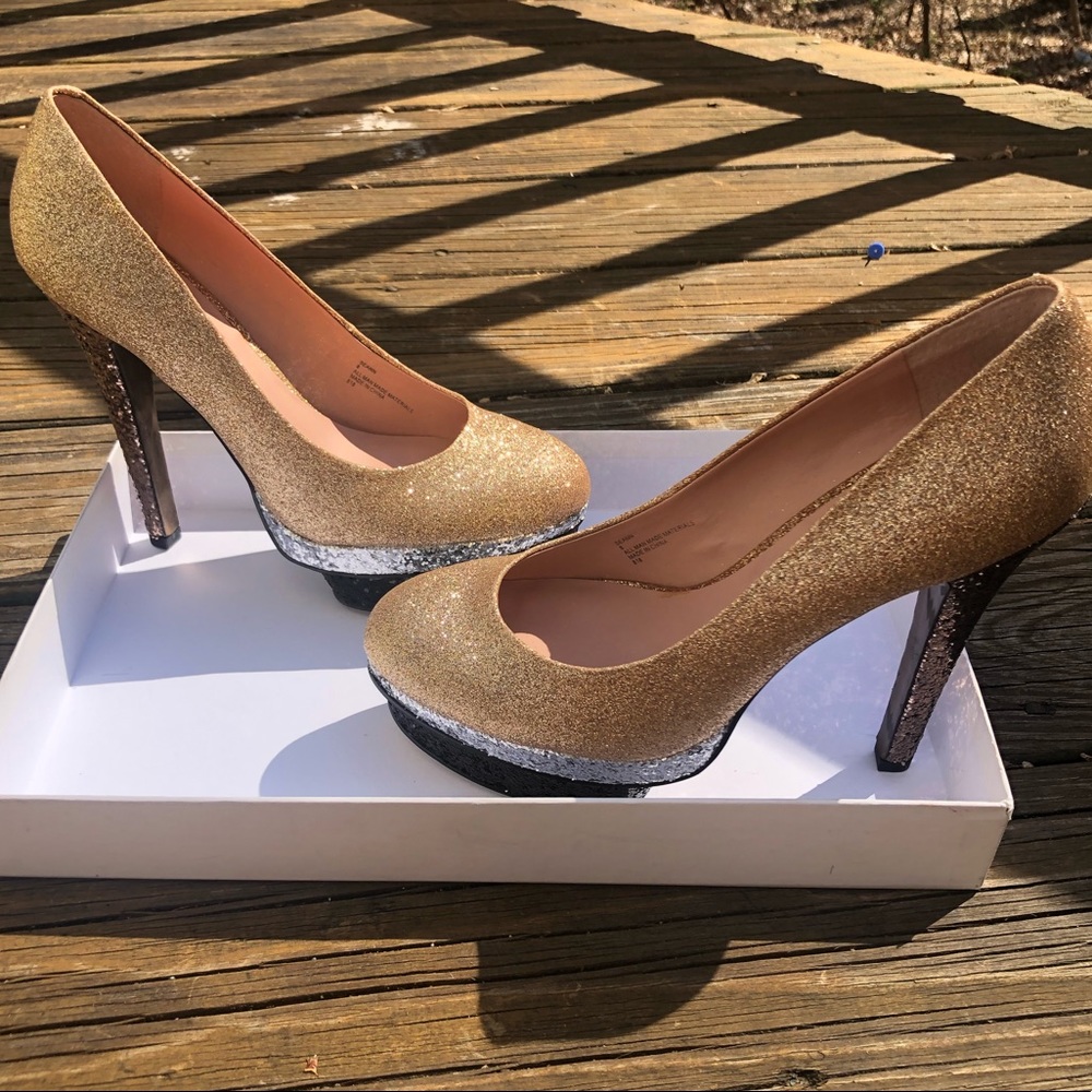 Betsey Johnson Gold Glitter Platform Pumps